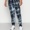 YOURTURN MONOCHROME TIE DYE JOGGER UNISEX - Pantaloni Sportivi - Black/off White -Sconto YOURTURN in Italia 0edc31c01d024468a27152acd4fe8944