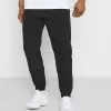 YOURTURN UNISEX - Pantaloni Sportivi - Black