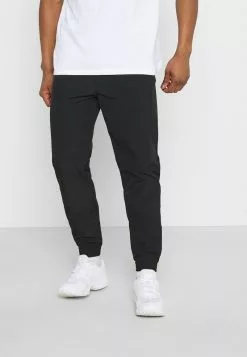 YOURTURN UNISEX - Pantaloni Sportivi - Black
