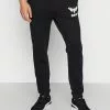 YOURTURN JOGGER UNISEX - Pantaloni Sportivi - Black -Sconto YOURTURN in Italia ae11ec89aabb4c63a15e25c24c250689